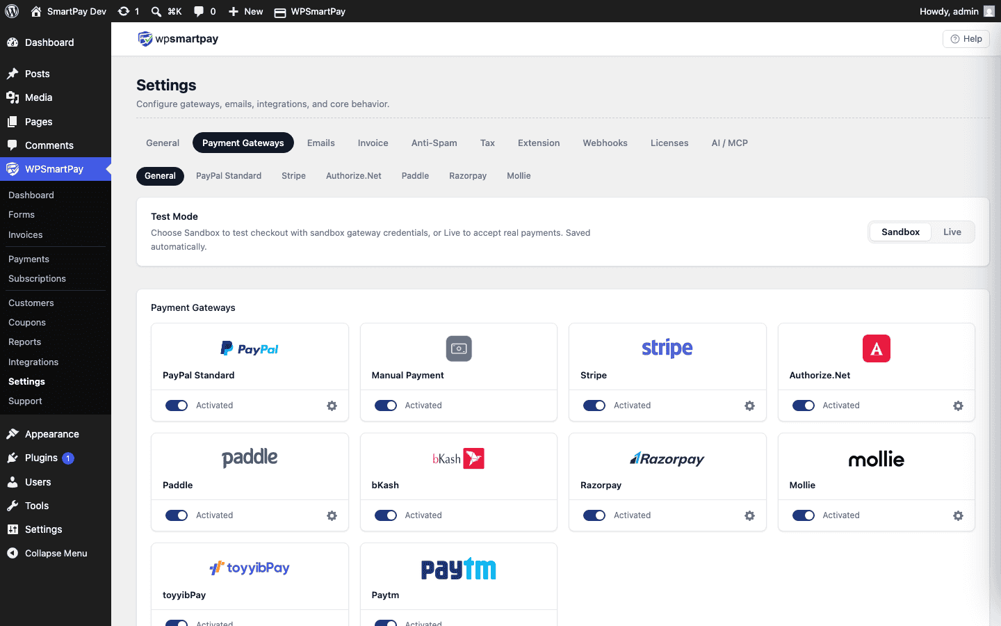 Screenshot of WP SmartPay Payment Gateways settings page showing gateway list, test mode toggle, and credential fields