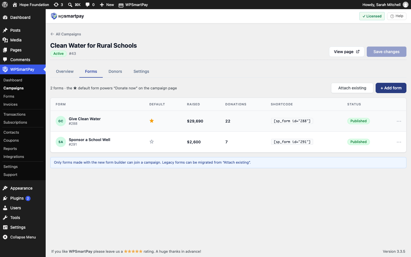 Screenshot of WP SmartPay campaign Forms tab showing attached forms and the default form star